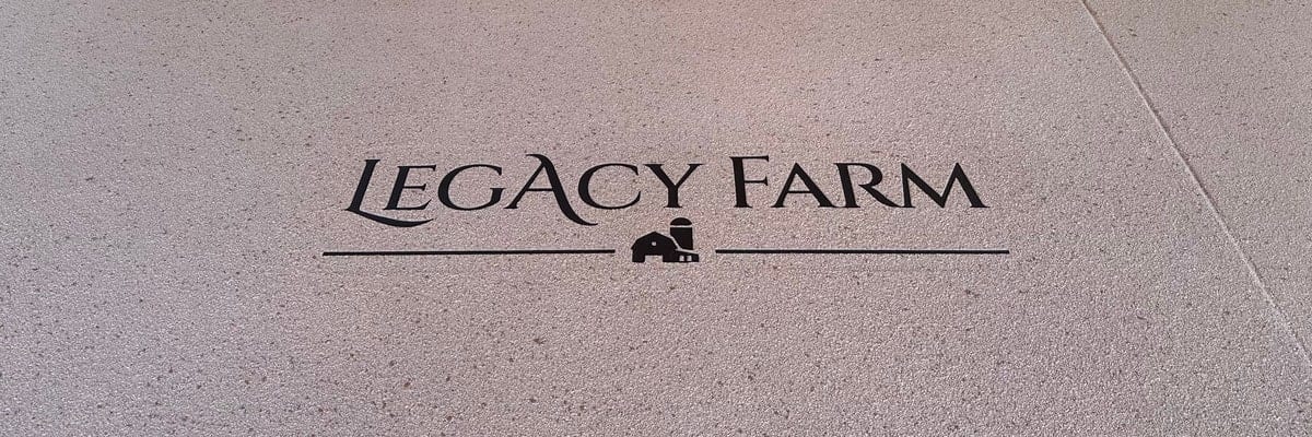Custom Legacy Farm logo sandblasted into decorative concrete by Bricks-n-Stones